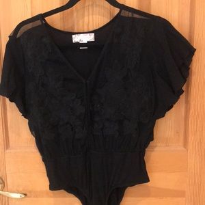 Women’s black bodysuit